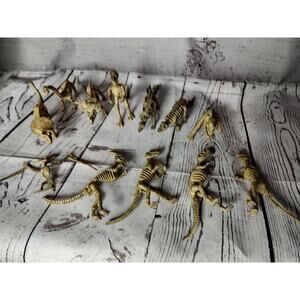 Lot of 12 skeleton dinosaur figures